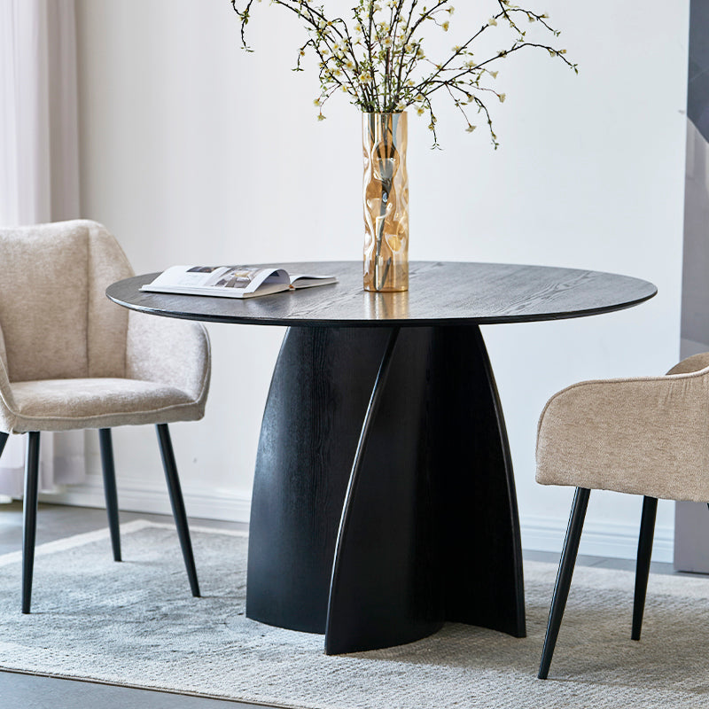 Mesa de jantar redonda Gemma UDT24012 em preto com tampo de MDF resistente e base em madeira laminada, perfeita para salas de jantar modernas.